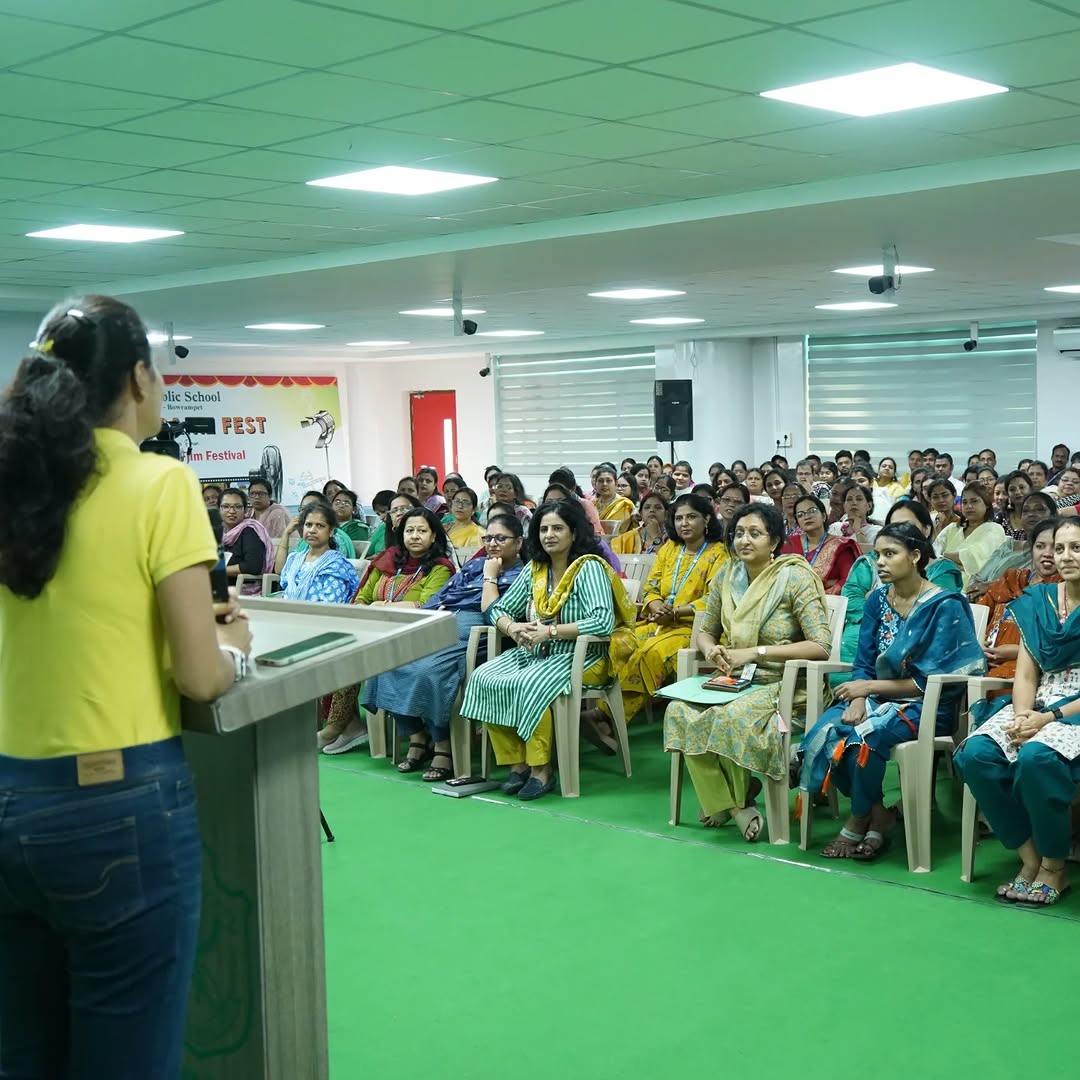 Dr. Shruti conducting a teacher wellness seminar